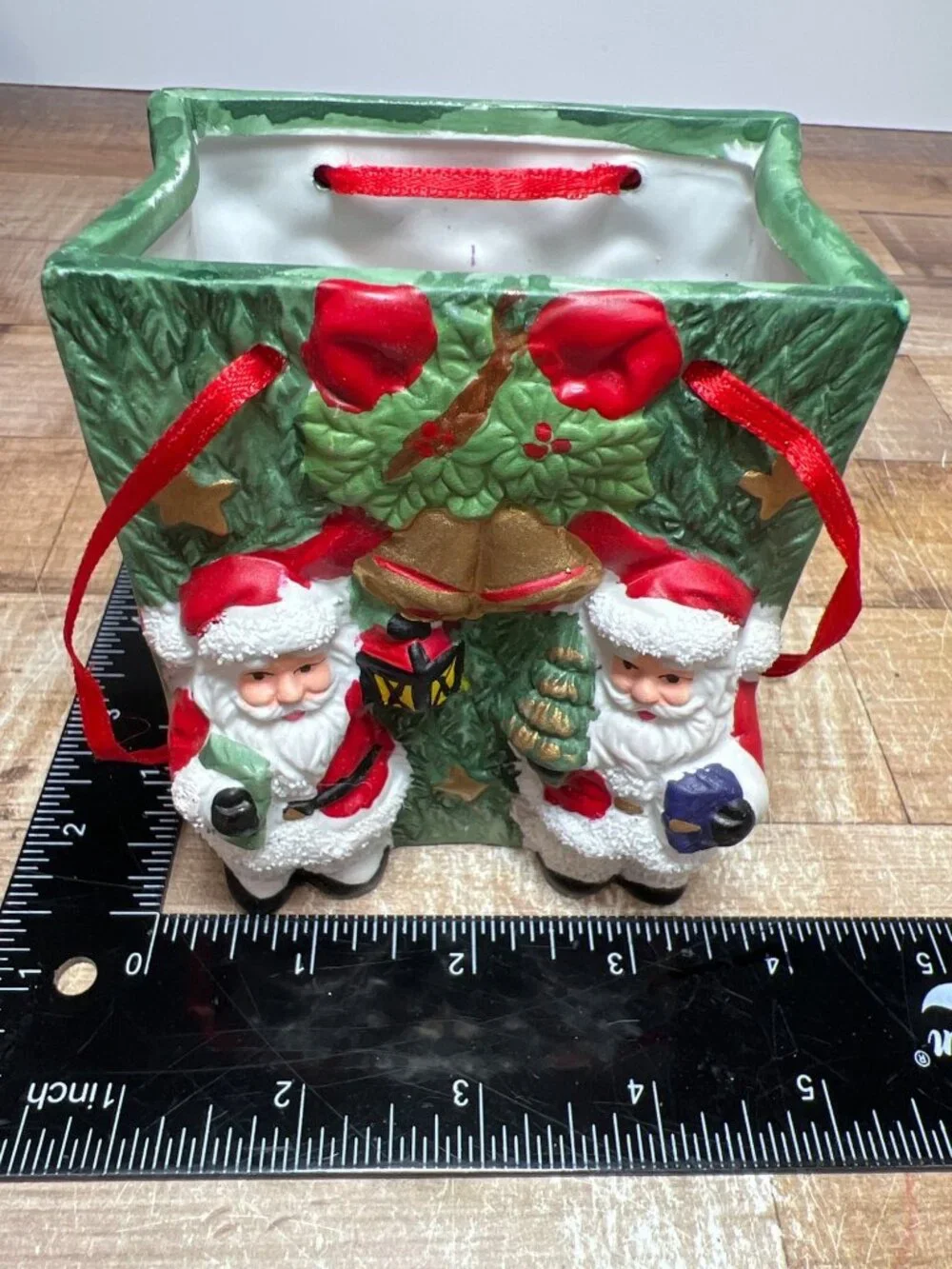Santa Claus Ceramic Christmas-Themed Container With Red Ribbon Hand